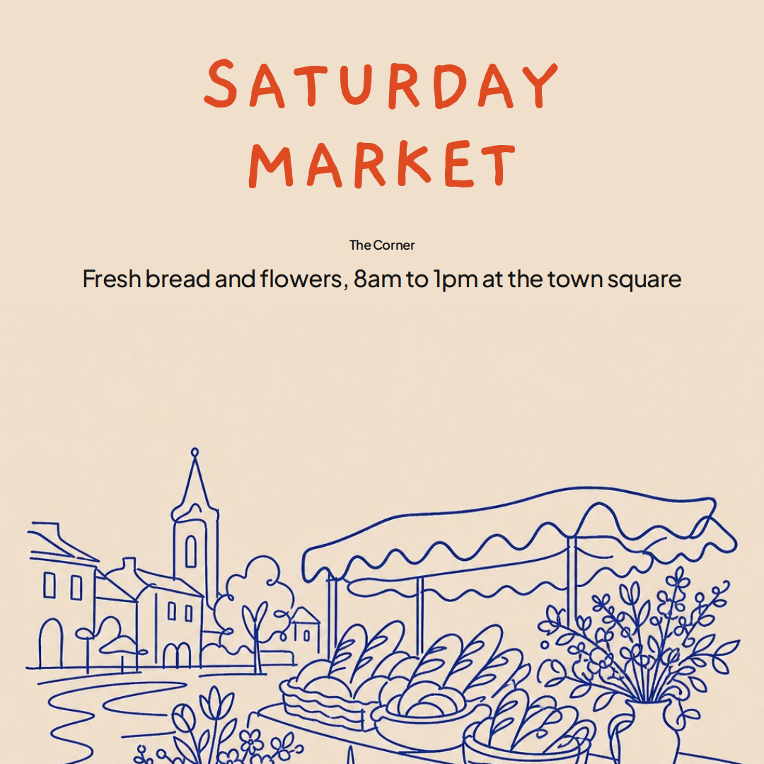 a cream-colored poster with hand-drawn navy line art of a town square, church, market stall with bread, and a flower vase, topped with bold orange text reading saturday market.